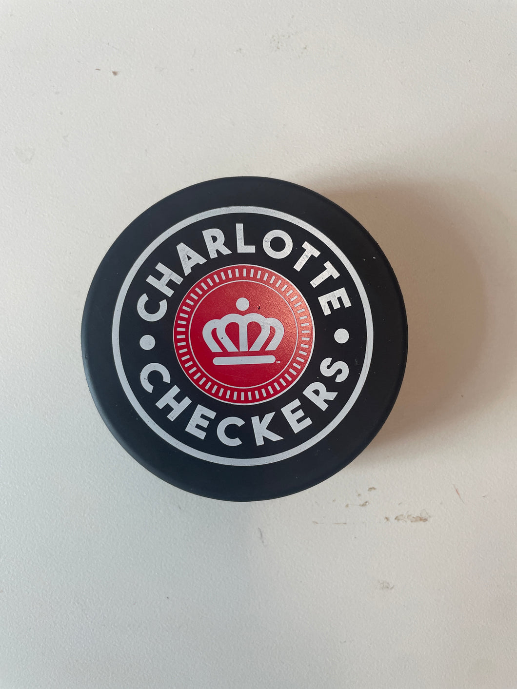 Puck bottle opener